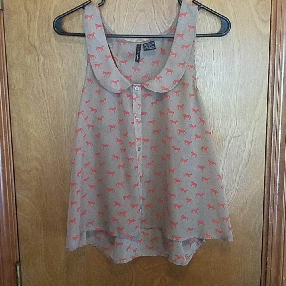 Polka dot and horse print dress shirt.